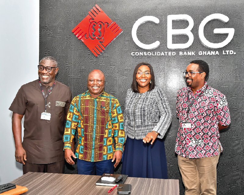 Joseph Cudjoe (2nd from left) with: Daniel Wilson Addo (left), and Nana Ama Poku (2nd from right)-Deputy Managing Director - Corporate Resources. Minister of Public Enterprises visits Consolidated Bank Ghana