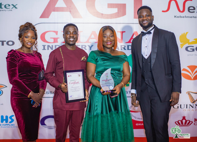 Dr Stephane Nwolley (2nd from left)- CEO of Npontu technologies, Deborah Asmah (2nd from right)- Chief Marketing Officer of Npontu, and other staff of the company displaying the award Npontu Technologies honoured at 11th AGI Awards