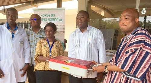Samuel Okudzeto Ablakwa (right), MP for North Tongu, making a symbolic presentation of the items to Dr Opoku Ware Ampomah (2nd from right), CEO of the KBTH Samuel Okudzeto Ablakwa (right), MP for North Tongu, making a symbolic presentation of the items to Dr Opoku Ware Ampomah (2nd from right), CEO of the KBTH