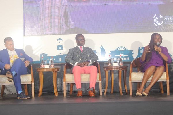 Mrs Odelia Ntiamoah right CEO of SNB Group having a group discussion with Mr Jennis Asiamah middle CEO of Jennis  Warmann Bespoke and Mr Rene Vincent Ernest left Managing Director of Labadi Beach Hotel at CXP annual conference in Accra. 