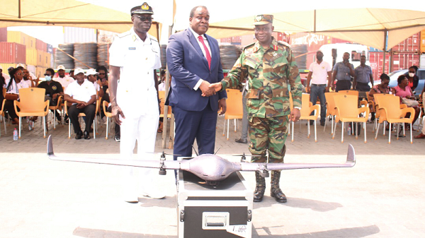One of the drones being tested. INSET: Benjamin Acolatse (middle) presenting a drone to Major General Dr Emmanuel Kotia (right) while Commodore Emmanuel Kwafo looks on One of the drones being tested. INSET: Benjamin Acolatse (middle) presenting a drone to Major General Dr Emmanuel Kotia (right) while Commodore Emmanuel Kwafo looks on