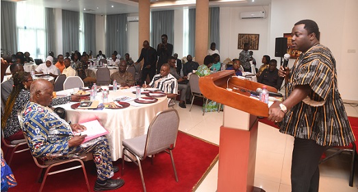 John Ntim Fordjour,  a Deputy Minister of Education, speaking at the event in Accra