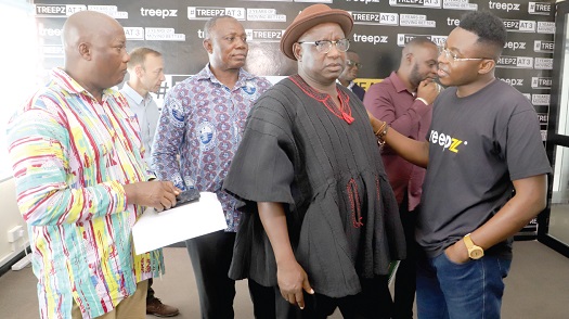 Isidore Kpotufe (right), Country Manager of Treepz, interacting with Godfred Abulbire (3rd from left), General Secretary of GPRTU, at the meeting in Accra. With them are Isaac Esau (2nd from left), Deputy General Secretary of the GPRTU, and Charles Narnor (left), Project Manager of the GPRTU. Picture: GABRIEL AHIABOR Isidore Kpotufe (right), Country Manager of Treepz, interacting with Godfred Abulbire (3rd from left), General Secretary of GPRTU, at the meeting in Accra. With them are Isaac Esau (2nd from left), Deputy General Secretary of the GPRTU, and Charles Narnor (left), Project Manager of the GPRTU. Picture: GABRIEL AHIABOR