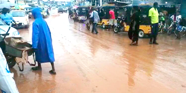 It is all muddy in the Twifo Praso township when it rains It is all muddy in the Twifo Praso township when it rains