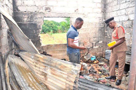 ACFO Ameyibor (right) at the scene ACFO Ameyibor (right) at the scene