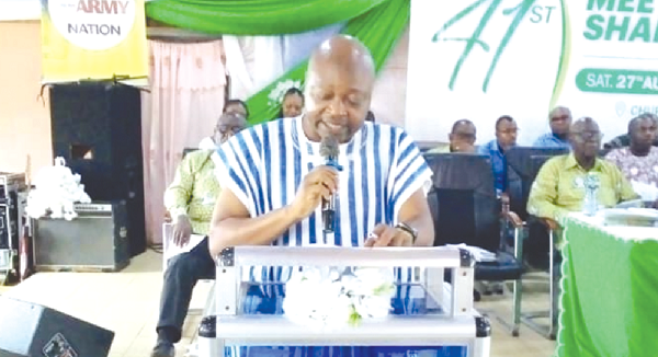 Curtis William Brentuo, Head of Legal Department of ARP Apex Bank, addressing the annual general meeting
