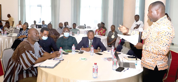 Yaw Attah Arhin (right) Water, Sanitation and Hygiene (WASH) Technical Specialist at the World Vision Ghana, addressing the Parliamentarians at the workshop in Accra. Picture: GABRIEL AHIABOR Yaw Attah Arhin (right) Water, Sanitation and Hygiene (WASH) Technical Specialist at the World Vision Ghana, addressing the Parliamentarians at the workshop in Accra. Picture: GABRIEL AHIABOR