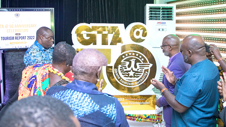 Dr Ibrahim Mohammed Awal (left), the Minister of Tourism, being assisted by some officials to unveil the GTA 50th Anniversary logo Dr Ibrahim Mohammed Awal (left), the Minister of Tourism, being assisted by some officials to unveil the GTA 50th Anniversary logo