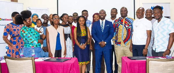 Trained journalists and facilitators in a group photo 15 Journalists trained on how to identify false data