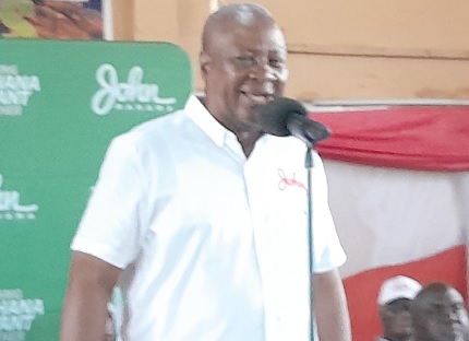 • Former President John Dramani Mahama (left) addressing party delegates • Former President John Dramani Mahama (left) addressing party delegates