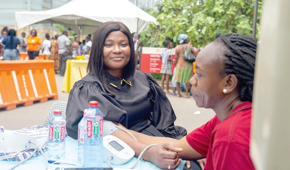 Kaakie Mann (left), Chief Executive of the Ga East Municipal Assembly, was among the beneficiaries of the health screening exercise Kaakie Mann (left), Chief Executive of the Ga East Municipal Assembly, was among the beneficiaries of the health screening exercise