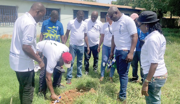 • Members of 1993 year group planting a Mahogany tree