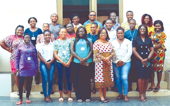 • Dr Charity Binka (3rd right front row), Executive Director of WOMEC, with journalists at the training programme 