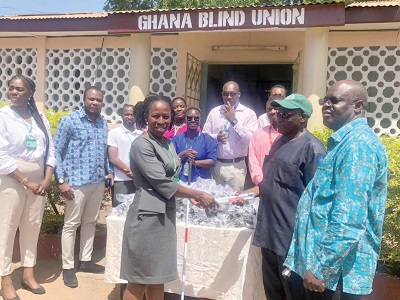 Eno Odame-Darkwa (left), HR Manager of Gokals-Laborex, presenting the white canes to George Abelse (2nd from right), the Regional President of the Ghana Blind Union Eno Odame-Darkwa (left), HR Manager of Gokals-Laborex, presenting the white canes to George Abelse (2nd from right), the Regional President of the Ghana Blind Union