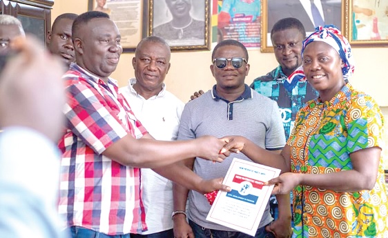 Kofi Obi-Dombie Ntiamoah (left), leader of the group, presenting the forms to Mercy Adu-Gyamfi (right), popularly known as Ama sey, former MP and aspirant Kofi Obi-Dombie Ntiamoah (left), leader of the group, presenting the forms to Mercy Adu-Gyamfi (right), popularly known as Ama sey, former MP and aspirant
