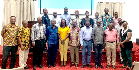 Dr George Afeti (middle) with some participants in the event Dr George Afeti (middle) with some participants in the event
