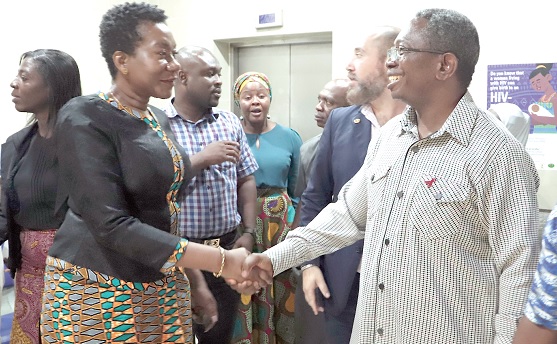 Dr Kyeremeh Atuahene (right), Director-General, Ghana Aids Commission, exchanging pleasantries with Leticia Adelaide Appiah (left), Executive Director, National Population Council, at the meeting. With them is Hector Sucilla Perez (2nd from right), UNAIDS Country Director, and other dignitaries. Picture: EDNA SALVO-KOTEY Dr Kyeremeh Atuahene (right), Director-General, Ghana Aids Commission, exchanging pleasantries with Leticia Adelaide Appiah (left), Executive Director, National Population Council, at the meeting. With them is Hector Sucilla Perez (2nd from right), UNAIDS Country Director, and other dignitaries. Picture: EDNA SALVO-KOTEY