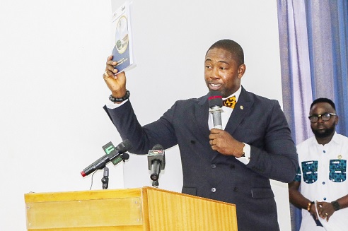 Bernard Okoe-Boye, CEO, NHIA, launching the 'Comparative Health Insurance System' book. Picture: ERNEST KODZI Bernard Okoe-Boye, CEO, NHIA, launching the 'Comparative Health Insurance System' book. Picture: ERNEST KODZI