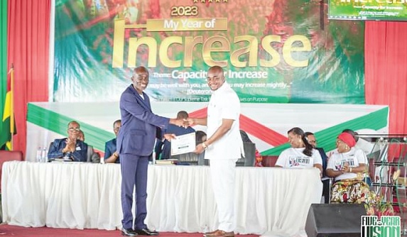 Bishop Dela Fiagome (left), President of FGCI, presenting a copy of the vision to Yohane Amarh Ashitey, MCE of Tema Bishop Dela Fiagome (left), President of FGCI, presenting a copy of the vision to Yohane Amarh Ashitey, MCE of Tema