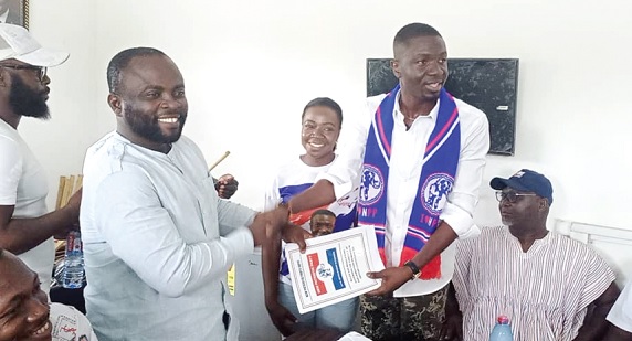 Nana Abrokwa Asare (2nd from right) submitting his nomination form to Christian Okomfo, the constituency secretary at Atimpoku Nana Abrokwa Asare (2nd from right) submitting his nomination form to Christian Okomfo, the constituency secretary at Atimpoku
