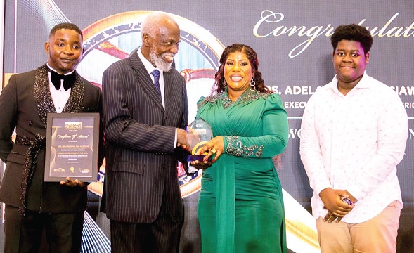 Prof. Stephen Adei (middle), a board member of the National Governance and Business Leadership, presenting Woman Entrepreneur of the Year award to Adelaide Siaw-Agyepong Prof. Stephen Adei (middle), a board member of the National Governance and Business Leadership, presenting Woman Entrepreneur of the Year award to Adelaide Siaw-Agyepong