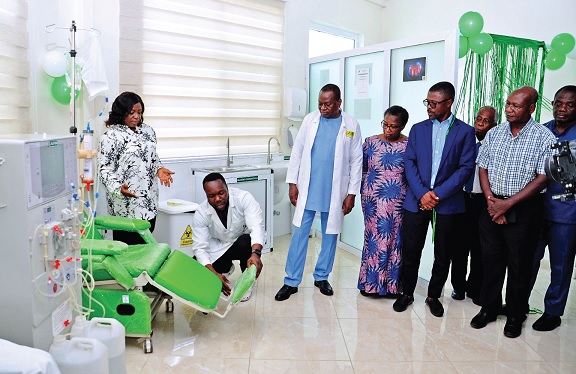 Dr Rebecca Acquaah-Arhin (left), the Medical Coordinator of Family Health Hospital, explaining the work of some of the equipment to the invited guests Dr Rebecca Acquaah-Arhin (left), the Medical Coordinator of Family Health Hospital, explaining the work of some of the equipment to the invited guests