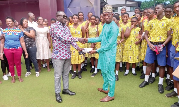 Abdul-Jalil Yakubu (right), Assemblymember of the Tatanaa South Electoral Area, presenting one of the Mathematical sets to Emmanuel Attah-Ashimedu, Headteacher of Madina Methodist Basic School Abdul-Jalil Yakubu (right), Assemblymember of the Tatanaa South Electoral Area, presenting one of the Mathematical sets to Emmanuel Attah-Ashimedu, Headteacher of Madina Methodist Basic School