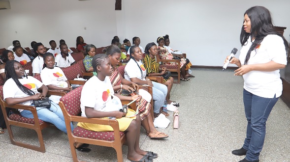 Dr Cynthia Addae (right), Executive Director, Boost Foundation, speaking to some of the beneficiaries of the Boost Foundation, Mastarcard artisan support training in Accra. Picture: SAMUEL TEI ADANO