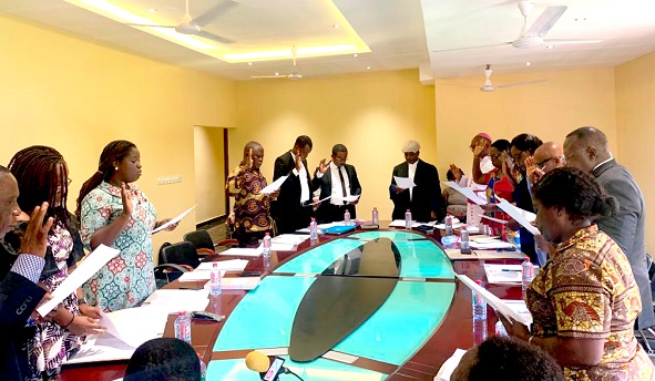 Members of the council taking the oath of office Members of the council taking the oath of office