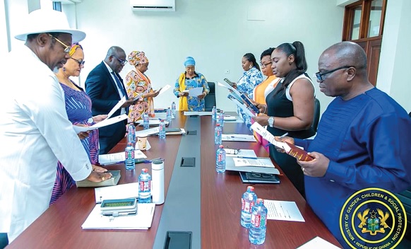 Lariba Zuweira Abudu (middle), Minister for Gender, Children and Social Protection, swearing in the board members Lariba Zuweira Abudu (middle), Minister for Gender, Children and Social Protection, swearing in the board members