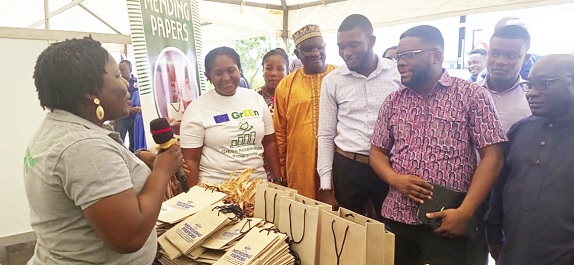 Laouali Sadda inspecting some of the products exhibited by one of the beneficiaries Laouali Sadda inspecting some of the products exhibited by one of the beneficiaries