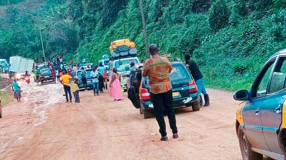 Stuck vehicles on the muddy portions of the main Samanye Barrier-Jaway Wharf road leaving passengers stranded. Picture: Dotsey Koblah Aklorbortu Stuck vehicles on the muddy portions of the main Samanye Barrier-Jaway Wharf road leaving passengers stranded. Picture: Dotsey Koblah Aklorbortu