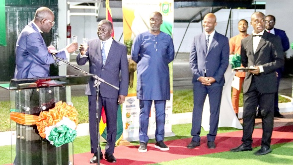 Assielou Felix Tanon (left), Ivorian Ambassador to Ghana, proposing a toast with Benito Owusu-Bio (2nd from left), a Deputy Minister of Lands and Natural Resources. With them are some officials of the Ivorian Embassy. Picture: ERNEST KODZI Assielou Felix Tanon (left), Ivorian Ambassador to Ghana, proposing a toast with Benito Owusu-Bio (2nd from left), a Deputy Minister of Lands and Natural Resources. With them are some officials of the Ivorian Embassy. Picture: ERNEST KODZI
