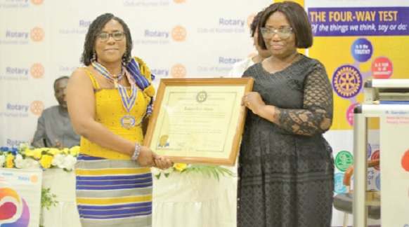 Matilda Adomolga-Adageba (left) receiving her certificate from Nana Esi Adade, Assistant Governor Matilda Adomolga-Adageba (left) receiving her certificate from Nana Esi Adade, Assistant Governor
