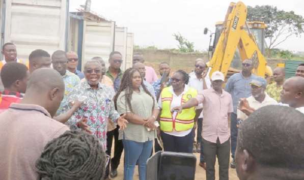 Dr Anthony Nsiah-Asare (arrowed), Presidential Advisor on Health, addressing the people at the site Dr Anthony Nsiah-Asare (arrowed), Presidential Advisor on Health, addressing the people at the site