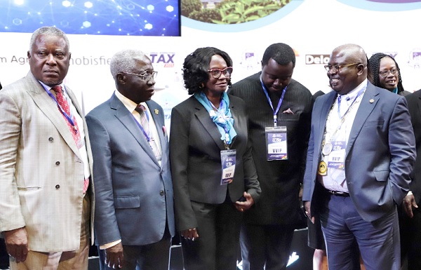 George Ohene Kwatia (right), President, Chartered Institute of Taxation Ghana (CITG), explaining a point to Yaw Osafo Maafo (2nd from left), Senior Minister, after the conference. Those with them are Emmanuel Obeng Asiedu (left), Chairman of the Chartered Institute of Taxation Ghana Council; Rev. John Ntim Fordjour (2nd from right), Deputy Minister of Education, and Novisi Afua Aryene (3rd from right), Justice of the Court of Appeal and Member of the CITG Council. Picture: EDNA SALVO-KOTEY