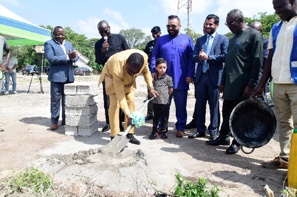 • Rev. Stephen Osei digging the ground with a shovel for commencement of work on the project. Looking on are Captain Budu Koomson (right), Business Consultant, Nabil Alahmad, (3rd from right) Chairman of i2 Development Company Prestige edifice to enhance KIA skyline