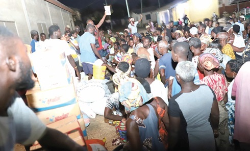 Some of the displaced persons awaiting their share of the items donated by Stephen Adjokatcher. Picture: DELLA RUSSEL OCLOO Some of the displaced persons awaiting their share of the items donated by Stephen Adjokatcher. Picture: DELLA RUSSEL OCLOO