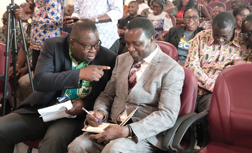 Eric Angel Carbonu (left), President, National Association of Graduate Teachers, conferring with Dr Yaw Osei Adutwum (right), Minister of Education, at the launch. Picture: EDNA SALVO-KOTEY Eric Angel Carbonu (left), President, National Association of Graduate Teachers, conferring with Dr Yaw Osei Adutwum (right), Minister of Education, at the launch. Picture: EDNA SALVO-KOTEY