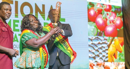 Charity Akortia — 2023 National Best Farmer, receiving the symbol of office from Nana Yaw Sarpong Siriboe, 2022 National Best Farmer Charity Akortia — 2023 National Best Farmer, receiving the symbol of office from Nana Yaw Sarpong Siriboe, 2022 National Best Farmer