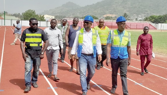 Pius Hadzide leading other officials to inspect the stadium last Friday Pius Hadzide leading other officials to inspect the stadium last Friday
