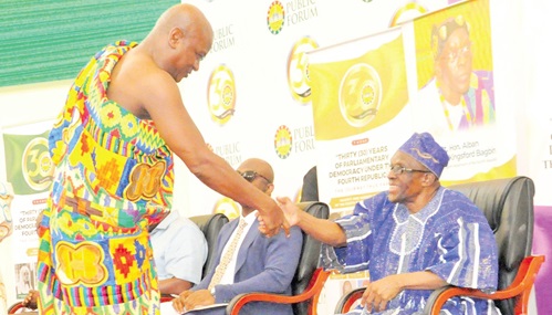Togbe Afede XIV (left) and Alban Sumana Kingsford Bagbin, Speaker of Parliament, exchanging pleasantries at the forum Togbe Afede XIV (left) and Alban Sumana Kingsford Bagbin, Speaker of Parliament, exchanging pleasantries at the forum