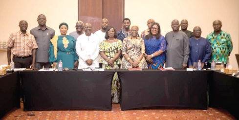 Ken Ofori-Atta (4th from left), Minister of Finance, with some officials after witnessing the signing agreement Ken Ofori-Atta (4th from left), Minister of Finance, with some officials after witnessing the signing agreement