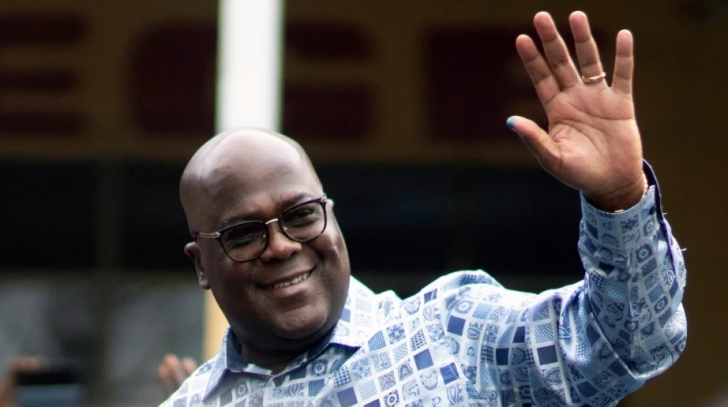 Congo's President Felix Tshisekedi waves to his supporters after casting his ballot inside a polling station during the presidential elections in Kinshasa, Democratic Republic of Congo, Democratic Republic of Congo President Tshisekedi re-elected after contested poll
