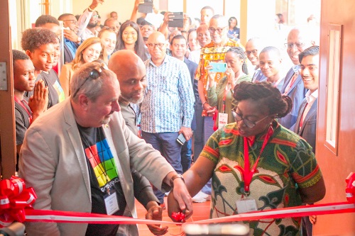 Dr Lucy Agyepong (right), Dean, Faculty of Engineering, Academic City University College, being assisted by Rod Crawford (left), Director, Software Technologies, Arm limited, and Stephen Ozoigbo (2nd from left), Senior Director, Emerging Economies, Arm, to cut tape to inaugurate the Academic City Ecosystem Lab. PICTURE: MAXWELL OCLOO Dr Lucy Agyepong (right), Dean, Faculty of Engineering, Academic City University College, being assisted by Rod Crawford (left), Director, Software Technologies, Arm limited, and Stephen Ozoigbo (2nd from left), Senior Director, Emerging Economies, Arm, to cut tape to inaugurate the Academic City Ecosystem Lab. PICTURE: MAXWELL OCLOO