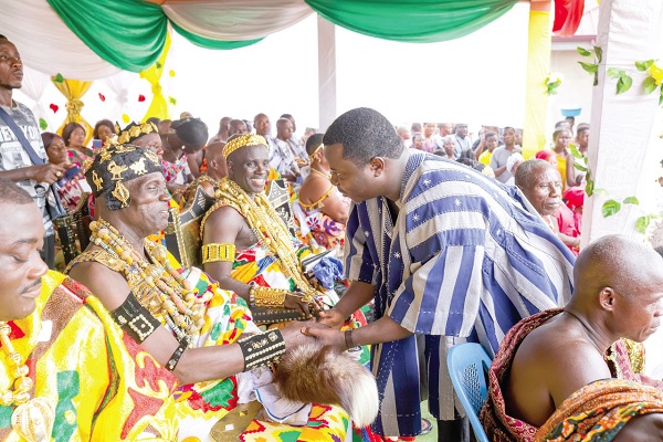 Rev. John Ntim Fordjour, Deputy Minister in charge of General Education, exchanging pleasantries with the traditional leaders of Gomoa Akropong Parents advised not to deny children access to education