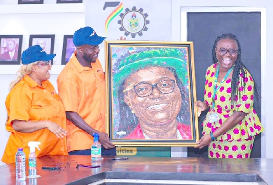 •Ebenezer Akwasi Antwi (2nd from left) presenting the portrait to Prof. Rita Akosua Dickson. Looking on is actress Matilda Asante Ghana Post honours KNUST Vice-Chancellor