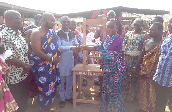 • Philomina Somiah-Kwaw (3rd from right), Headmistress of Moree Secondary Technical School, receiving furniture from Ekow Nkrumah Bentum, CEO of Kings Group Kings Group CEO donates furniture to Moree schools