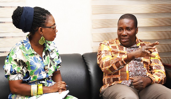 Augustina Tawiah (left), a journalist of the Daily Graphic, interviewing Dr Stephen Ayisi Addo