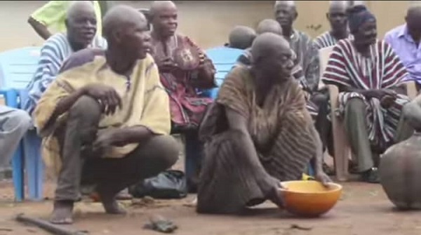 Koori Dacharga Mangu ni u Nabomzi and Heuhing Kiipo Mwiiri together with some elders of Tuna speaking to gods of Tuna during a Tuna land and community ritual Going through puberty rites as a Vagla boy